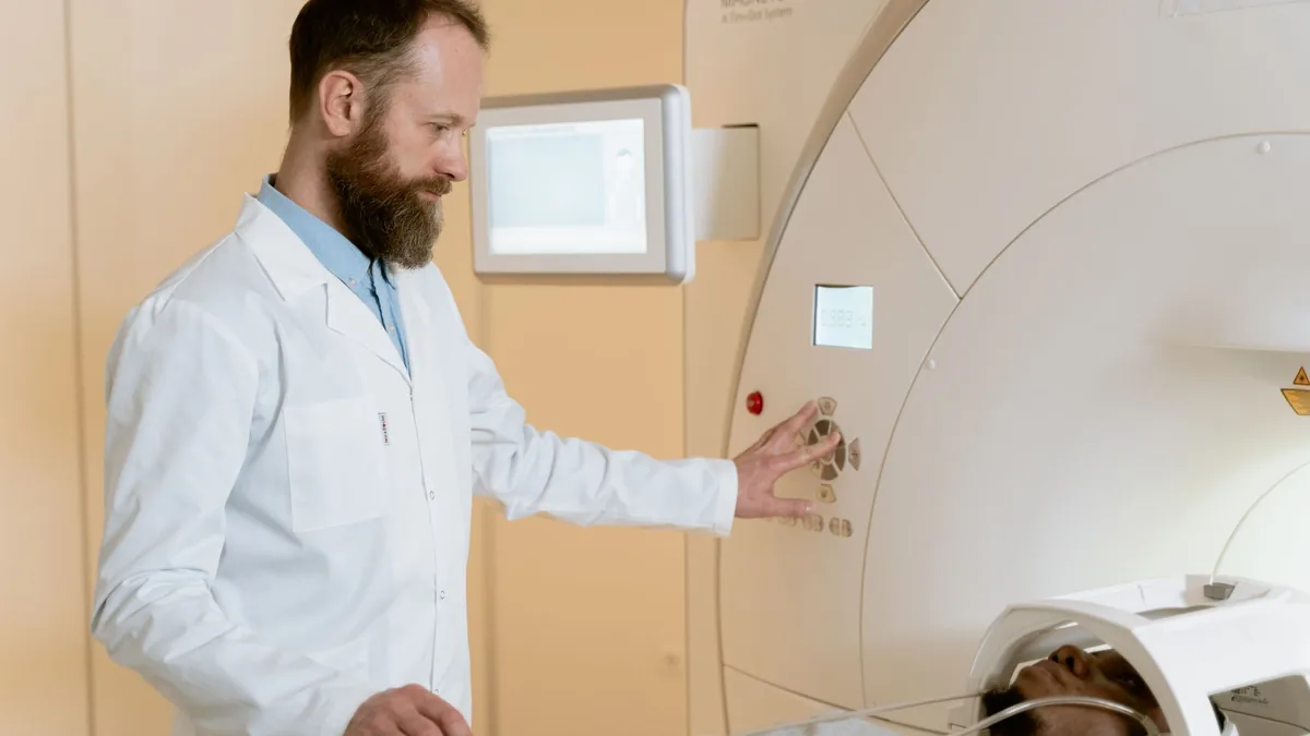A patient consults with a technician in a modern MRI room, highlighting advanced healthcare facilities. — Illustration accompanying coverage of semaglutide heart effects research, including a cardiac CT substudy of the STOP trial
