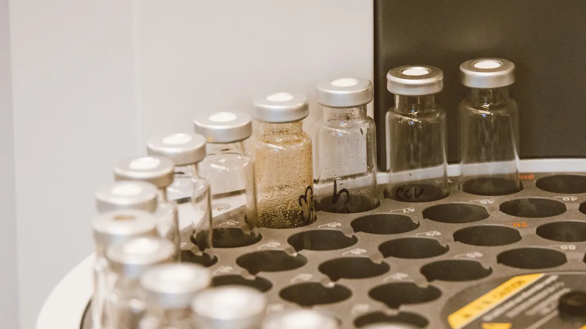 Vials arranged in a lab rack, showcasing scientific organization and research preparation. — Illustration accompanying a report on synthetic semaglutide reporting gaps raised in a Diabetes, Obesity & Metabolism letter